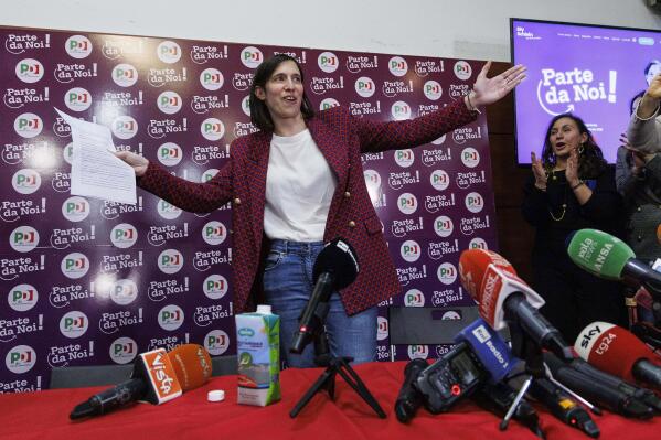 Elly Schlein gestures at the headquarters of her electoral committee, after the announcement of the partial results of the Democratic Party primaries in Rome, Italy, Sunday, Feb. 26, 2023. Schlein, a 37-year-old U.S.-Italian national and longtime left-wing political operative, has defied polls to become the first woman to head Italy’s opposition Democratic Party. (Roberto Monaldo/LaPresse via AP)