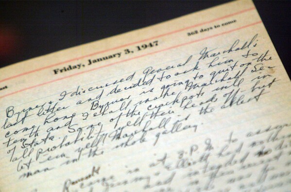 A portion of a page from a Harry Truman presidential diary, is shown at the National Archives in Washington Thursday, July 10, 2003. (AP Photo/Rick Bowmer)