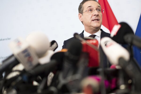 
              Austrian Vice Chancellor Heinz-Christian Strache (Austrian Freedom Party), center, addresses the media during press conference at the sport ministry in Vienna, Austria, Saturday, May 18, 2019. Strache says he is resigning after two German newspapers published footage of him apparently offering lucrative government contracts to a potential Russian benefactor. (AP Photo/Michael Gruber)
            