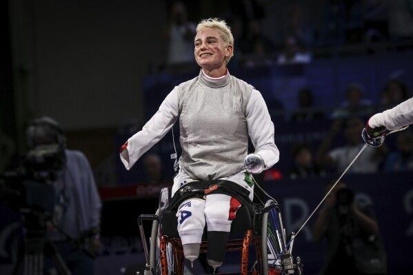 Italy's Beatrice Maria Vio Grandis reacts after winning the women's foil wheelchair fencing bronze medal match at the 2024 Paralympics, Wednesday, Sept. 4, 2024, in Paris, France. (AP Photo/Thomas Padilla)