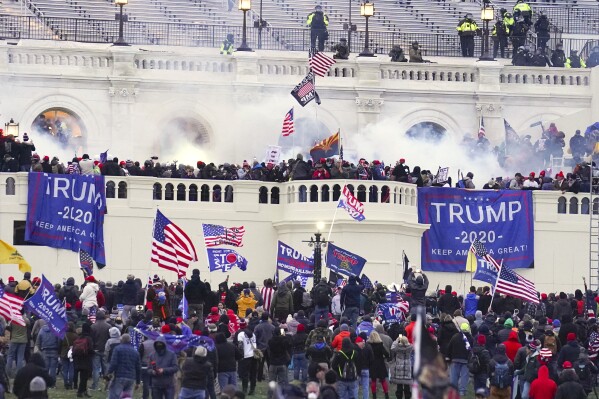 Rioters appear at the U.S. Capitol on Jan. 6, 2021, in Washington. (AP Photo/John Minchillo, File)