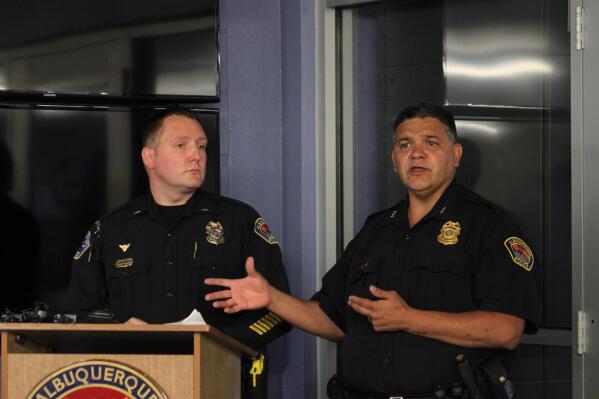 FILE - Deputy Chief Harold Medina, right, and Lt. Joe Viers discuss the Albuquerque Police Department's policy for responding to protests during a news conference in Albuquerque, New Mexico, Monday, June 22, 2020. The U.S. Department of Justice say New Mexico's largest city has made enough progress with court-ordered police reforms that oversight of much of the ongoing process will be turned over to Albuquerque officials. (AP Photo/Susan Montoya Bryan, File)