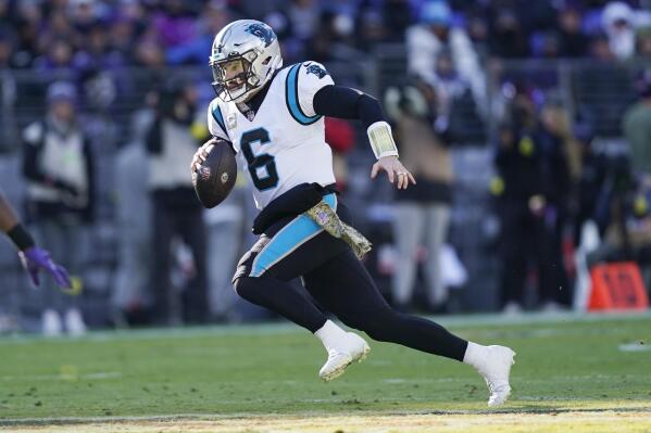 Carolina Panthers quarterback Baker Mayfield (6) takes off in the first half of an NFL football game against the Baltimore Ravens Sunday, Nov. 20, 2022, in Baltimore. (AP Photo/Patrick Semansky)