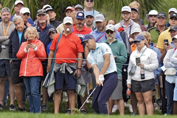 Jordan Spieth hits from the rough on the fifth hole during the second round of the Valspar Championship golf tournament Friday, March 22, 2024, at Innisbrook in Palm Harbor, Fla. (AP Photo/Chris O'Meara)