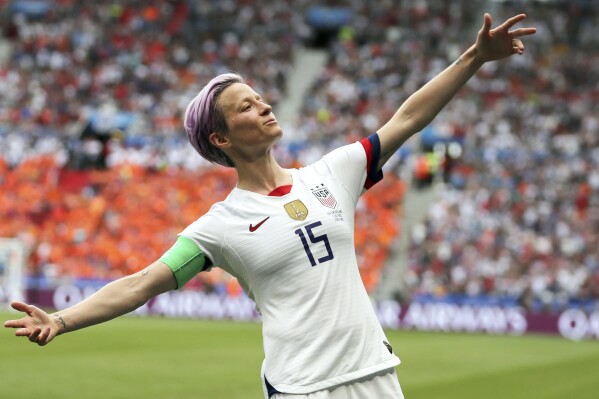 FILE - In this July 7, 2019 file photo, United States' Megan Rapinoe celebrates after scoring the opening goal from the penalty spot during the Women's World Cup final soccer match against The Netherlands at the Stade de Lyon in Decines, outside Lyon, France. Days before heading to her fourth World Cup, Rapinoe announced she’ll retire at the end of the National Women's Soccer League season. Rapinoe, 38, made the announcement on Twitter Saturday, July 8, 2023. (AP Photo/Francisco Seco, File)