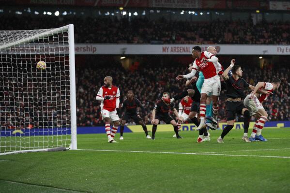 Arsenal's Gabriel Magalhaes, third right, scores the third goal during the English Premier League soccer match between Arsenal and Southampton at Emirates stadium in London, Saturday, Dec. 11, 2021. (AP Photo/Ian Walton)