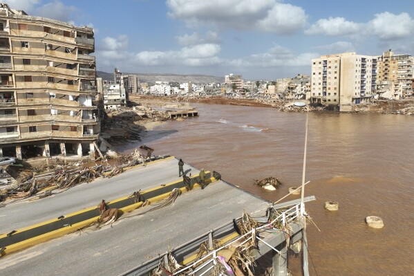 A general view of the city of Derna is seen on Tuesday, Sept. 12., 2023. Mediterranean storm Daniel caused devastating floods in Libya that broke dams and swept away entire neighborhoods in multiple coastal towns, the destruction appeared greatest in Derna city. (AP Photo/Jamal Alkomaty)