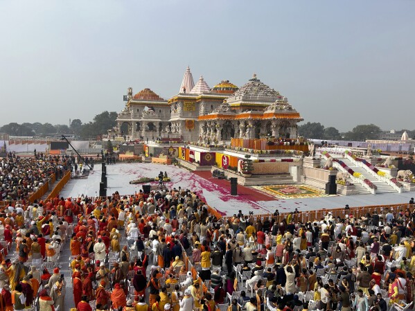 A general view of the audience during the opening of a temple dedicated to Hindu deity Lord Ram, in Ayodhya, India, Monday, Jan.22, 2024. Indian Prime Minister Narendra Modi is set to open a controversial Hindu temple built on the ruins of an ancient mosque in the holy city of Ayodhya in a grand event that is expected to galvanize Hindu voters months before a general election. (AP Photo/Rajesh Kumar Singh)
