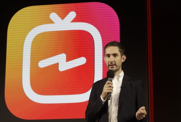 
              FILE - In this Tuesday, June 19, 2018, file photo, Kevin Systrom, CEO and co-founder of Instagram, prepares for an announcement about IGTV in San Francisco. In a statement late Monday, Sept. 24, 2018, Systrom said in a statement that he and Mike Krieger, Instagram’s chief technical officer, plan to leave the company in the next few weeks and take time off “to explore our curiosity and creativity again.” (AP Photo/Jeff Chiu, File)
            