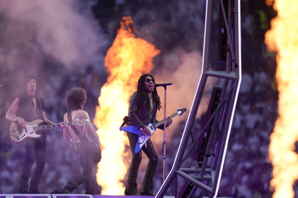 Lenny Kravitz performs prior to the Champions League final soccer match between Borussia Dortmund and Real Madrid at Wembley stadium in London, Saturday, June 1, 2024. (AP Photo/Kin Cheung)