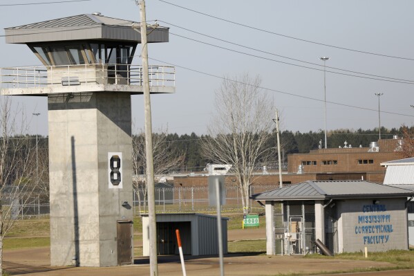 FILE - A watch tower stands high on the grounds of the Central Mississippi Correctional Facility, March 20, 2019, in Pearl, Miss. Incarcerated women in Mississippi were forced to mix raw cleaning chemicals without protective equipment, with one alleging she later contracted terminal cancer and was denied timely medical care, a federal lawsuit filed Wednesday, Feb. 14, 2024, alleges. (AP Photo/Rogelio V. Solis, File)