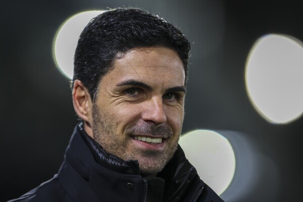 CAPTION CORRECTS THE DATE - Arsenal's manager Mikel Arteta smiles before the English Premier League soccer match between Luton and Arsenal at Kenilworth Road, Luton, England, Tuesday, Dec. 5, 2023. (AP Photo/Ian Walton)