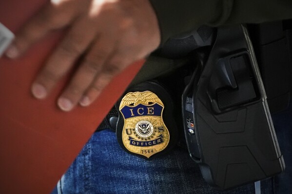 A deportation officer with Enforcement and Removal Operations in U.S. Immigration and Customs Enforcement's New York City field office conducts a brief before an early morning operation, Tuesday, Dec. 17, 2024, in the Bronx borough of New York. (AP Photo/Julia Demaree Nikhinson, File)