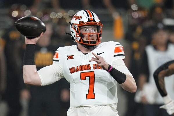 Oklahoma State quarterback Alan Bowman throws a pass against Arizona State during the first half of an NCAA college football game Saturday, Sept. 9, 2023, in Tempe, Ariz. (AP Photo/Ross D. Franklin)