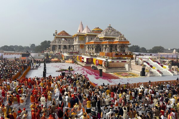 A general view of the audience during the opening of a temple dedicated to Hindu deity Lord Ram, in Ayodhya, India, Monday, Jan.22, 2024. Indian Prime Minister Narendra Modi is set to open a controversial Hindu temple built on the ruins of an ancient mosque in the holy city of Ayodhya in a grand event that is expected to galvanize Hindu voters months before a general election. (AP Photo/Rajesh Kumar Singh)