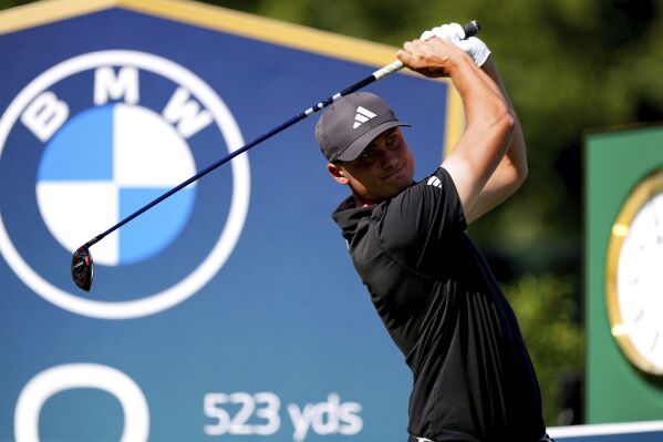 Ludvig Aberg tees off on the 18th during day one of the PGA Championship at Wentworth Golf Club in Virginia Water, Surrey, England, Thursday, Sept. 14, 2023. (Zac Goodwin/PA via AP)