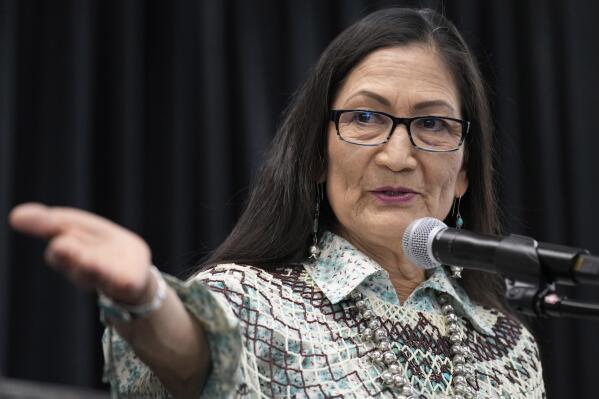 FILE - Interior Secretary Deb Haaland speaks at an event to celebrate the designation of the Avi Kwa Ame National Monument on April 14, 2023, in Las Vegas. The Interior Department announced a partnership with the National Endowment for the Humanities on Wednesday, April 26, 2023, to document the experiences of thousands of Native American, Alaska Native and Native Hawaiian students at federally funded schools across the country. (AP Photo/John Locher, File)