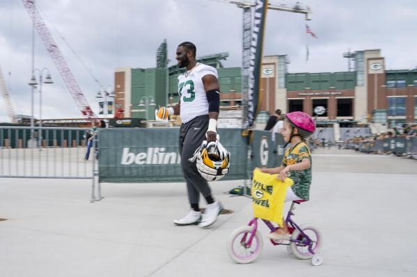 Green Bay Packers' Yosh Nijman walks to the NFL football team's practice field Wednesday, July 27, 2022, in Green Bay, Wis. (AP Photo/Morry Gash)