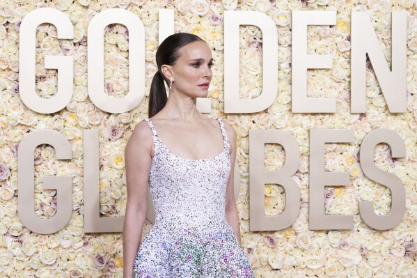 Natalie Portman arrives at the 81st Golden Globe Awards on Sunday, Jan. 7, 2024, at the Beverly Hilton in Beverly Hills, Calif. (Photo by Jordan Strauss/Invision/AP)