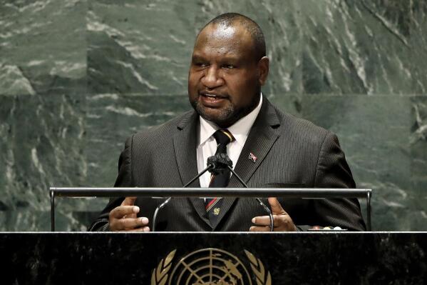 FILE - Prime Minister of Papua New Guinea James Marape addresses the 76th session of the United Nations General Assembly, Friday Sept. 24, 2021, at the UN headquarters. Marape tested positive for COVID-19 when he arrived in Beijing last week to attend the opening ceremony of the Winter Olympic Games and had to cut short his stay. (Peter Foley/Pool Photo via AP, File)