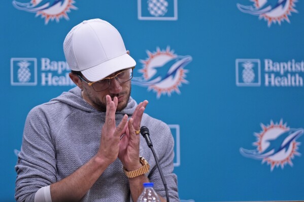 Miami Dolphins head coach Mike McDaniel answers questions during a news conference before an NFL football practice, Tuesday, May 21, 2024 at the Dolphins training facility in Miami Gardens, Fla. (AP Photo/Wilfredo Lee)