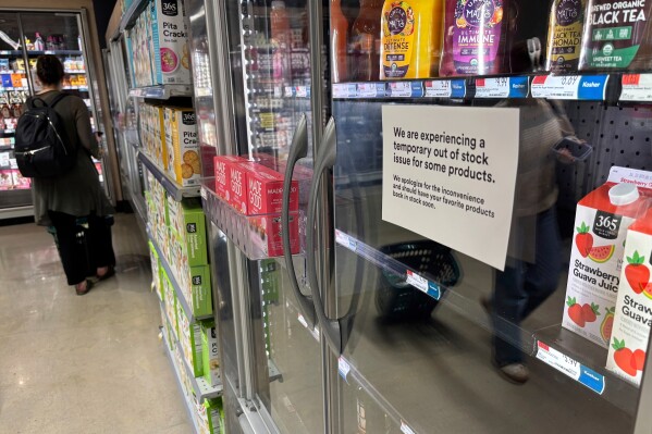 Some shelves at a Whole Foods in New York City sit emptier on June 10, 2025. (AP Photo/Wyatte Grantham-Philips)
