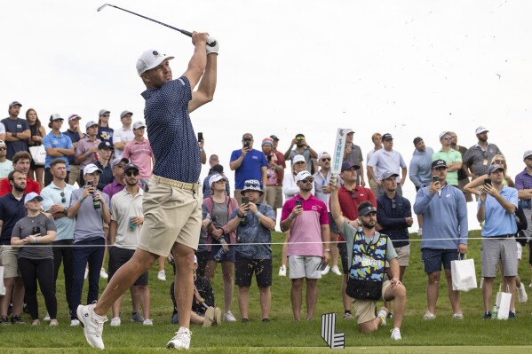 Captain Bryson DeChambeau, of Crushers GC, hits from the 15th tee during the final round of LIV Golf Chicago at Rich Harvest Farms, Sunday, Sept. 24, 2023, in Sugar Grove, Ill. (Chris Trotman/LIV Golf via AP)