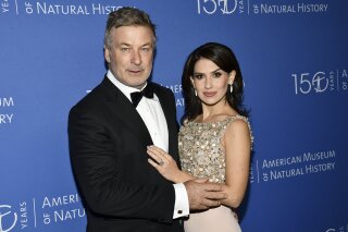 FILE - Alec Baldwin, left, and wife Hilaria Baldwin attend the American Museum of Natural History's Museum Gala on Nov. 21, 2019, in New York. The couple on Wednesday, Sept. 9, 2020, announced the arrival of a baby boy, their fifth child together. Hilaria Baldwin posted on Instagram and said the boy “is perfect and we couldn't be happier. Stay tuned for a name.” (Photo by Evan Agostini/Invision/AP, File)