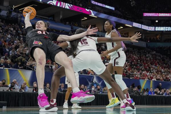 South Carolina defense smothers Louisville in semifinal win
