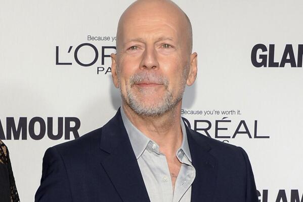 FILE - In this Nov. 10, 2014, file photo, Bruce Willis attends the 2014 Glamour Women of the Year Awards in New York. Willis has signed on to play Cus D’Amato in “Cornerman,” a film about the famed boxing trainer. The project was announced Monday, May 7, 2018, at the Cannes Film Festival, where it will be shopped for buyers. (Photo by Evan Agostini/Invision/AP, File)