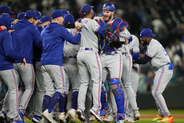 Rangers wrap up first playoff berth since 2016, help eliminate Mariners  with 6-1 victory