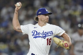 FILE - Los Angeles Dodgers relief pitcher Shelby Miller delivers during the third inning in Game 1 of a baseball NL Division Series against the Arizona Diamondbacks, Oct. 7, 2023, in Los Angeles. Miller agreed Friday, Dec. 22, to a $3.25 million, one-year contract with the Detroit Tigers, a deal including a 2025 team option and performance bonuses that could be worth up to $11 million over two seasons if he closes regularly. (AP Photo/Ashley Landis, File)