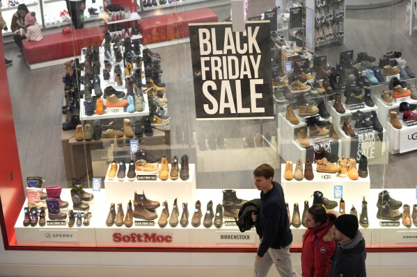 People shop at Mall of America for Black Friday deals, Friday, Nov. 24, 2023, in Bloomington, Minn. (AP Photo/Abbie Parr)