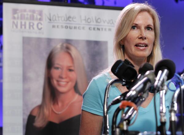 FILE - Beth Holloway, mother of Natalee Holloway, speaks during the opening of the Natalee Holloway Resource Center (NHRC) at the National Museum of Crime & Punishment in Washington, June 8, 2010. Natalee, 18, of Mountain Brook, Alabama, vanished while on a high school graduation trip to Dutch-owned Aruba, an island in the Caribbean in 2005. She never showed up for a flight home and her disappearance made international headlines. (AP Photo/Pablo Martinez Monsivais, File)