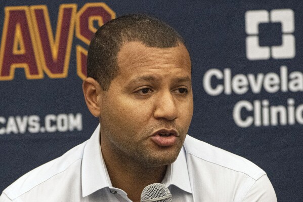 FILE- Cleveland Cavaliers' Koby Altman speaks with reporters during an NBA basketball news conference at the team's training facility in Independence, Ohio, Friday, July 30, 2021. Altman was arrested and charged with operating a vehicle under the influence, Friday night, Sept. 15, 2023. Ohio State Highway Patrol said the 41-year-old was stopped by officers for a traffic violation. According to a report obtained by the AP, the officers suspected Altman of impairment during the stop and he was taken into custody. (AP Photo/Phil Long, FIle)