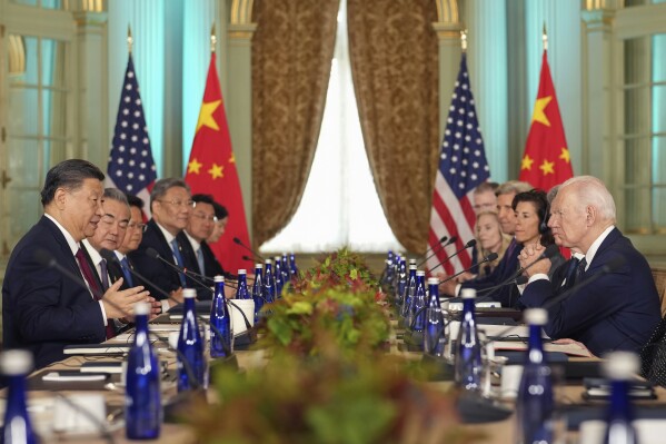 President Joe Biden listens as China's President President Xi Jinping speaks during their meeting at the Filoli Estate in Woodside, Calif., Wednesday, Nov, 15, 2023, on the sidelines of the Asia-Pacific Economic Cooperative conference. (Doug Mills/The New York Times via AP, Pool)