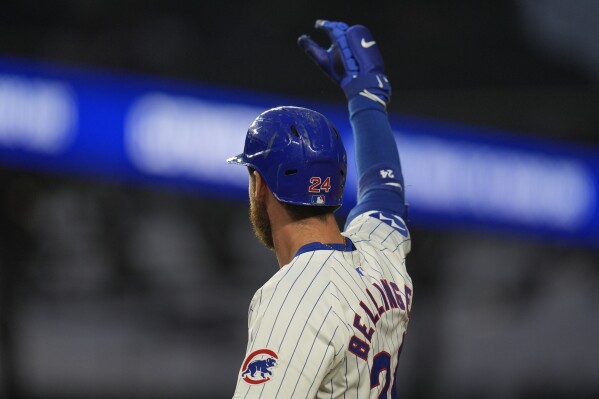 Cubs defeat Nationals 7-6 to stay in playoff contention