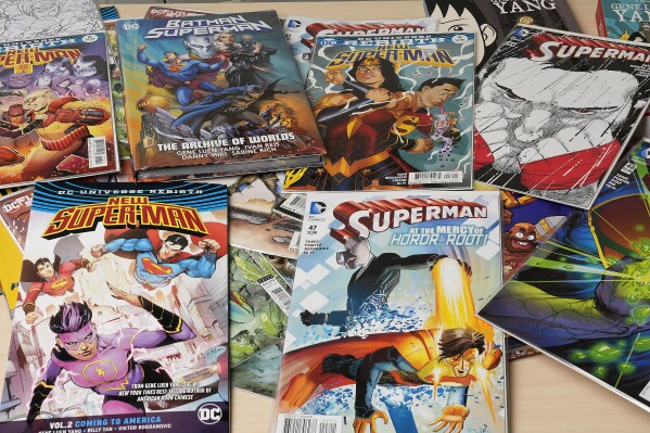 Comic books are displayed in Gene Yang's home Tuesday, April 1, 2025, in San Jose, Calif. (AP Photo/Tony Avelar)
