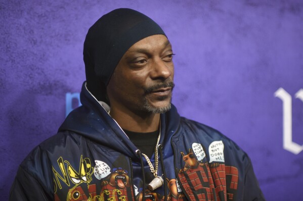 Snoop Dogg arrives at the world premiere of "The Underdoggs" on Tuesday, Jan. 23, 2024, at The Culver Theater in Culver City, Calif. (Photo by Richard Shotwell/Invision/AP)