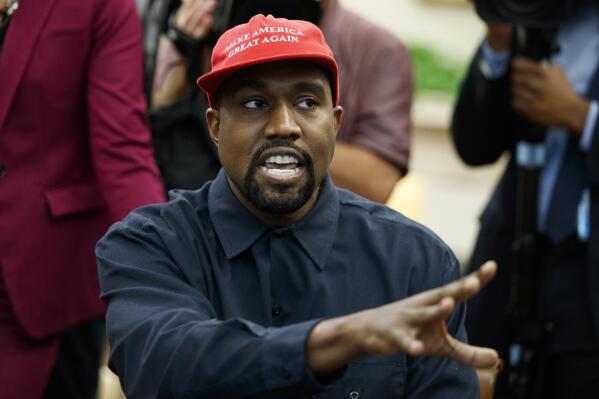 FILE - Rapper Kanye West speaks during a meeting in the Oval Office of the White House with President Donald Trump, Thursday, Oct. 11, 2018, in Washington. Kanye West was escorted out of the California headquarters of athletic shoemaker Skechers Wednesday, Oct. 26, 2022 after he showed up unannounced. Skechers says West, also known as Ye, also engaged in unauthorized filming at its corporate headquarters in Manhattan Beach and was escorted out by two executives.  (AP Photo/Evan Vucci, File)