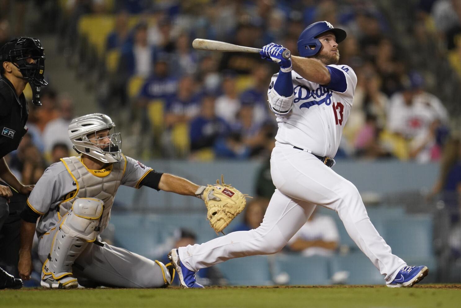 Pittsburgh Pirates third baseman Ke'Bryan Hayes fields a ball hit by Los  Angeles Dodgers' Justin Turner before throwing him out at first during the  third inning of a baseball game Tuesday, May