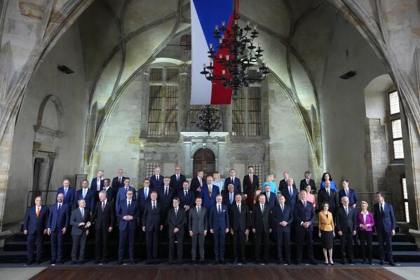 Leaders pose for a group photo during a meeting of the European Political Community at Prague Castle in Prague, Czech Republic, Thursday, Oct 6, 2022. Leaders from around 44 countries are gathering Thursday to launch a "European Political Community" aimed at boosting security and economic prosperity across the continent, with Russia the one major European power not invited. (AP Photo/Petr David Josek)