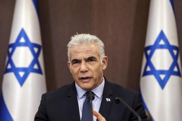 Israel's Prime Minister Yair Lapid attends the weekly cabinet meeting in Jerusalem, on Sept. 18, 2022. Israel's prime minister on Monday, Sept. 19, 2022 vowed to begin production at a contested Mediterranean natural gas field “as soon as it is possible,” threatening to raise tensions with Lebanon's Hezbollah militant group.(Ronaldo Schemidt/Pool Photo via AP)