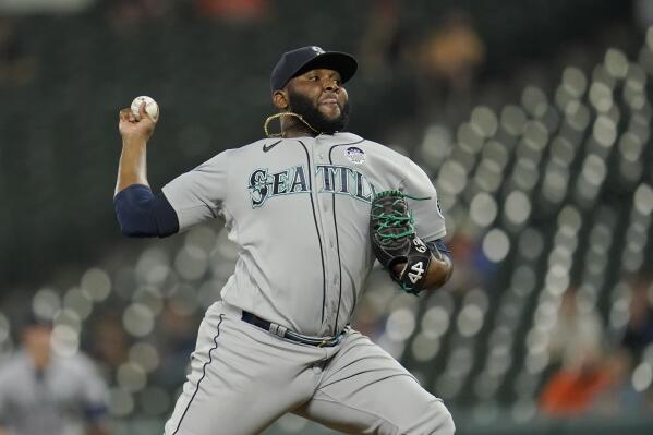 Seattle Mariners relief pitcher Diego Castillo throws a pitch to the Baltimore Orioles during the ninth inning of a baseball game, Thursday, June 2, 2022, in Baltimore. The Mariners won 7-6 in ten innings. (AP Photo/Julio Cortez)