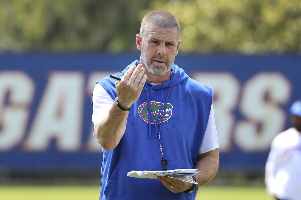 Florida coach Billy Napier turns to 30-year-old Austin Armstrong to revamp a porous defense | AP News