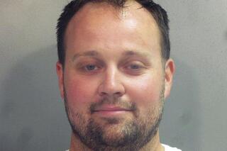 This photo provided by the Washington County (Ark.) Jail shows Joshua Duggar. Former reality TV Star Josh Duggar is being held in a northwest Arkansas jail after being arrested, Thursday, April 29, 2021 by federal authorities, but it’s unclear what charges he may face.  (Washington County Arkansas Jail via AP)