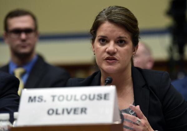 FILE - In this July 24, 2018, file photo, New Mexico Secretary of State Maggie Toulouse Oliver speaks during a House Oversight and Government Reform Committee on Capitol Hill in Washington. During the tumultuous period immediately following the November 2020 presidential election, election workers across the country faced harassment and threats. Since then, legislators in a small but growing number of states have proposed measures to help protect those workers by creating or boosting penalties for such threats or assaults. (AP Photo/Susan Walsh, File)