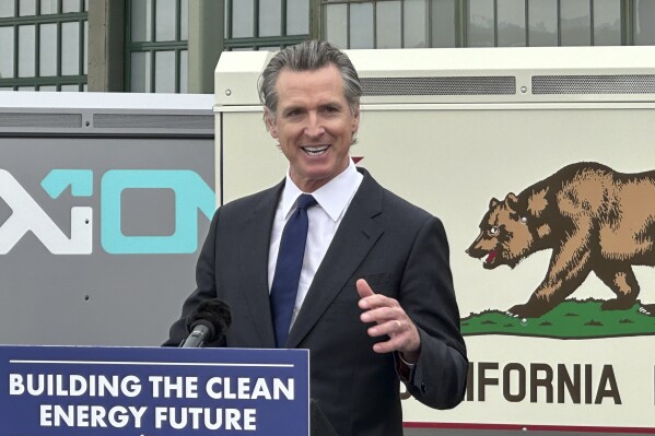 FILE - California Gov. Gavin Newsom speaks during a news conference, Thursday, May 25, 2023, in Richmond, California. Gov. Newsom begins a week-long trip to China on Monday, Oct. 23, 2023, where he'll meet with various Chinese officials to discuss climate policy and opportunities for collaboration. (AP Photo/Adam Beam, File)