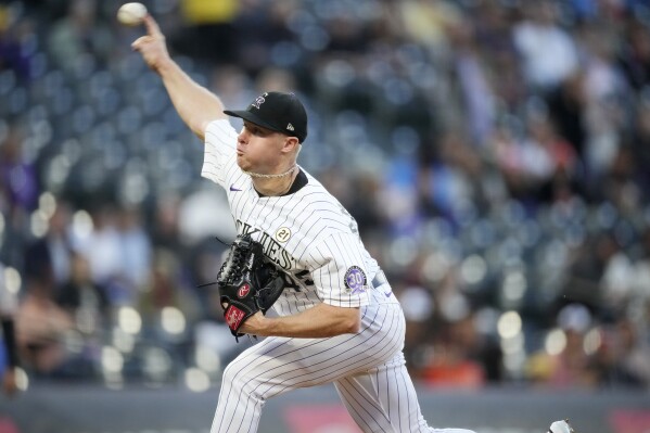 Colorado Rockies starting pitcher Chase Anderson works against the San Francisco Giants during the first inning of a baseball game Friday, Sept. 15, 2023, in Denver. (AP Photo/David Zalubowski)