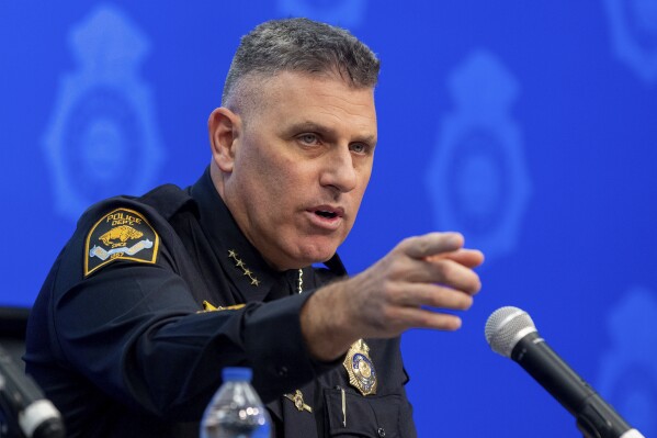 Omaha Police Chief Todd Schmaderer speaks during a press conference at Police Headquarters in Omaha, Neb., Thursday, Feb. 8, 2024. about two off-duty police officers who shot and killed two men while working weekend security at a bar. (Chris Machian/Omaha World-Herald via AP)